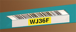 Barcode label on angled label carrier for high beams
