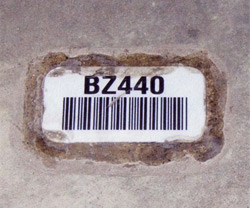 Heavy duty floor label for bulk storage warehouse